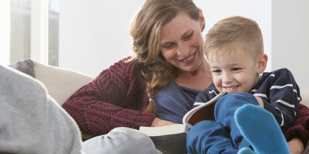 Mother and child reading a book