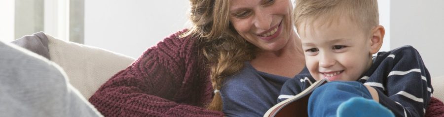 Mother and child reading a book