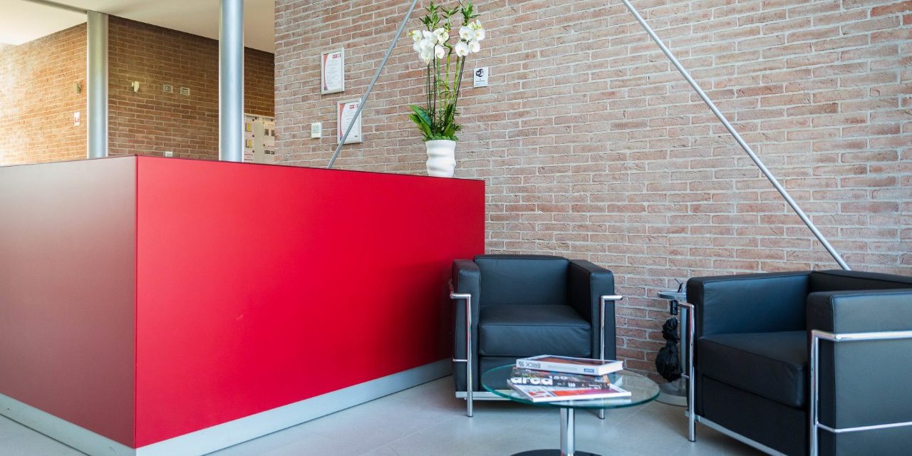 Entrance with chairs at Wienerberger Italy offices 