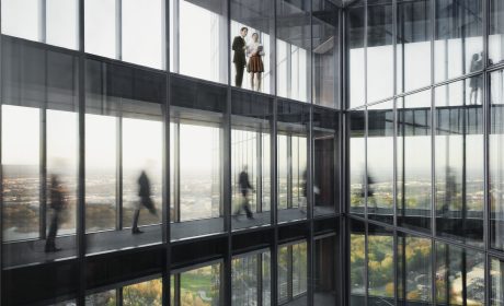 People walking on connecting bridges at Vienna Twin Towers