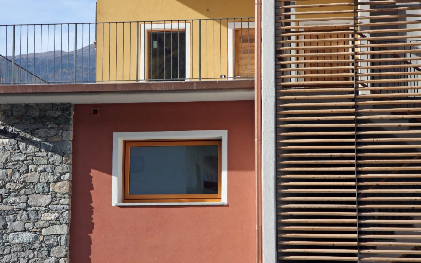 Detalis with stone of multi family house Aosta renovation with Porotherm