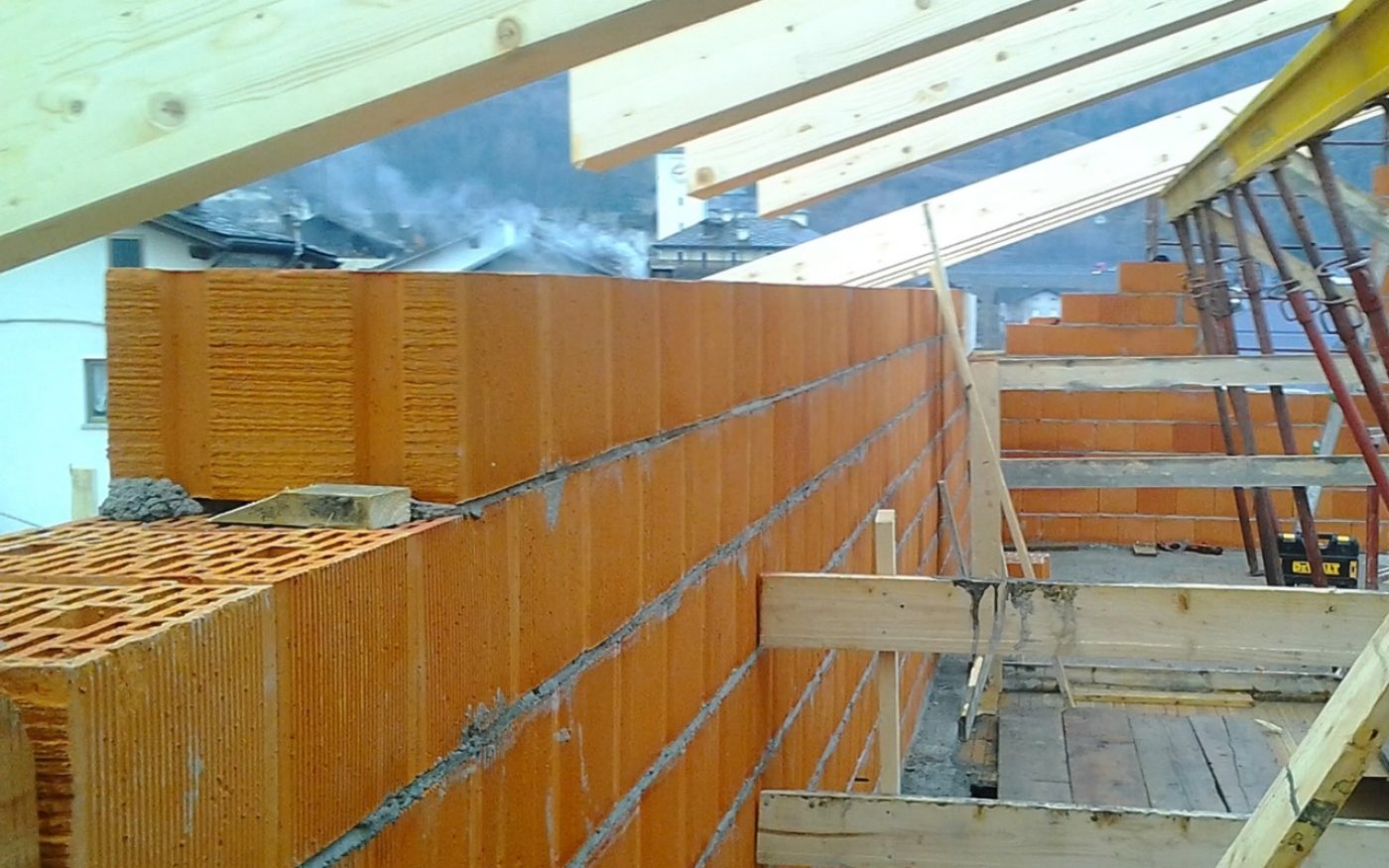 Wall on the Roof of multi family house Aosta renovation with Porotherm