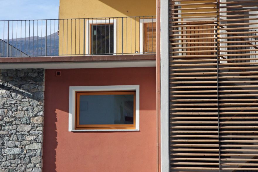 Detalis with stone of multi family house Aosta renovation with Porotherm